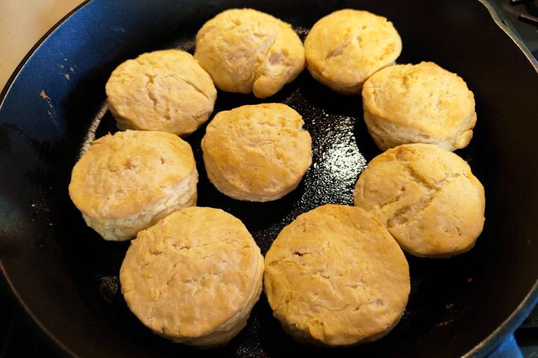 Buttermilk biscuits fresh out of the oven with light golden brown crusts.